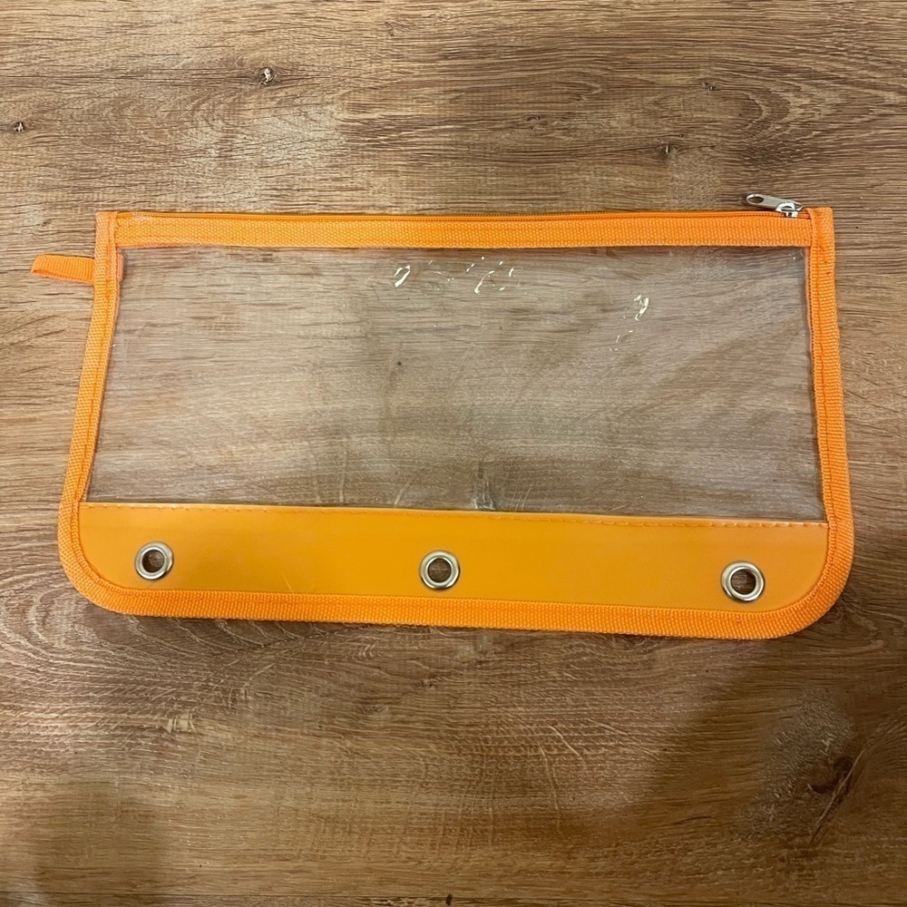 Orange and clear plastic pencil case​​​​​​​